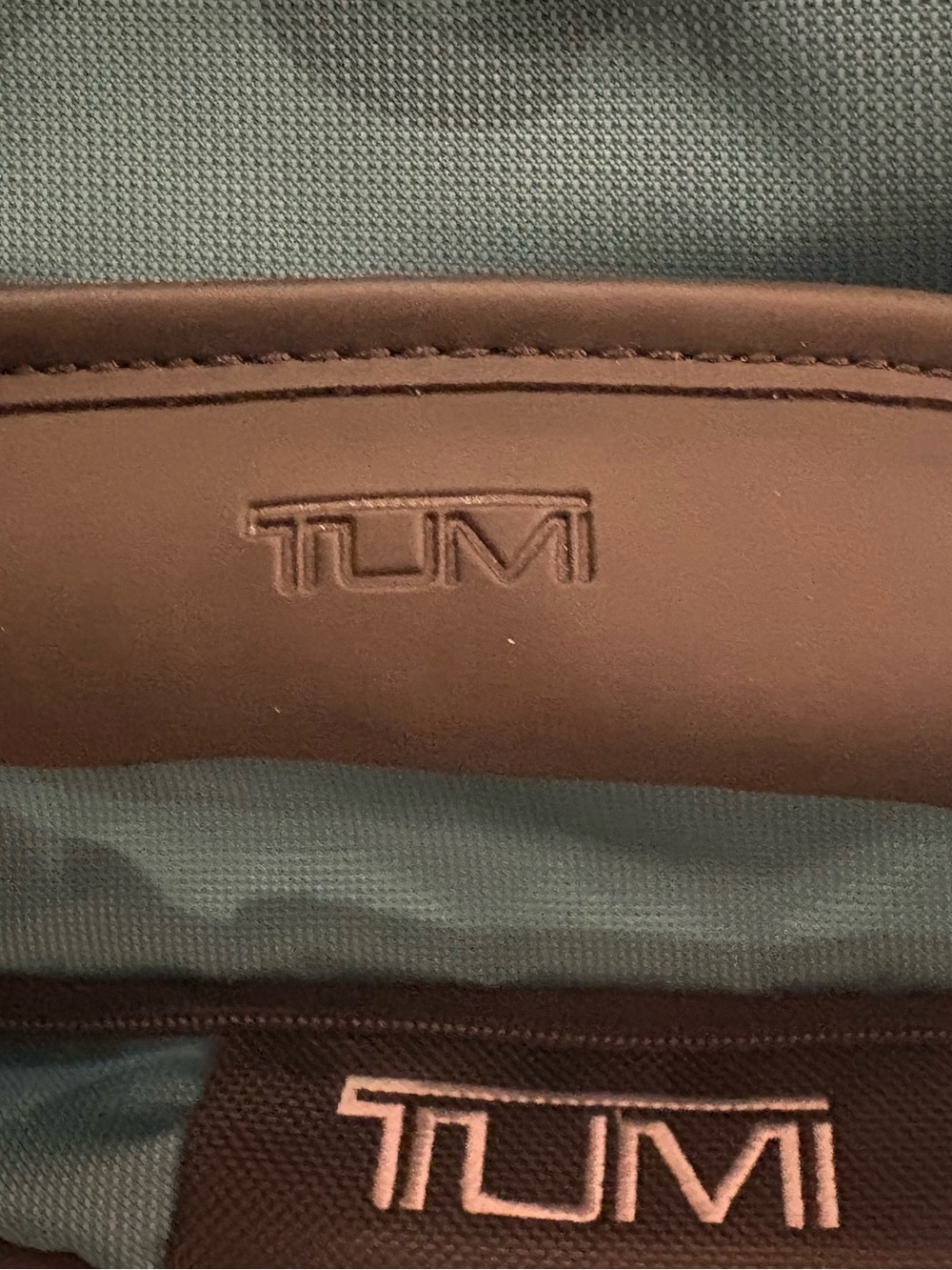 Tumi Teal Travel Duffel / backpack 
Very roomy to store things in very sturdy - Picture 5 of 13